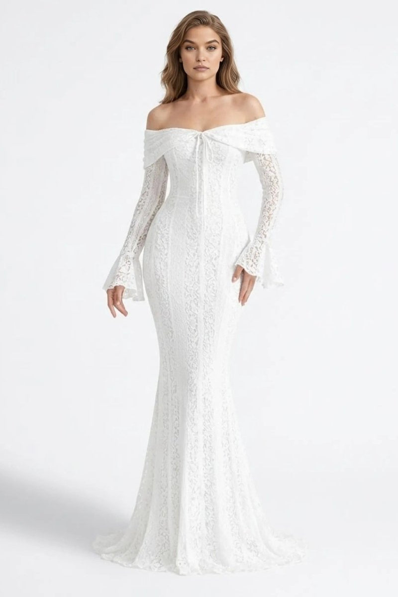 Woman wearing a white off-shoulder gown with long sleeves on a white background