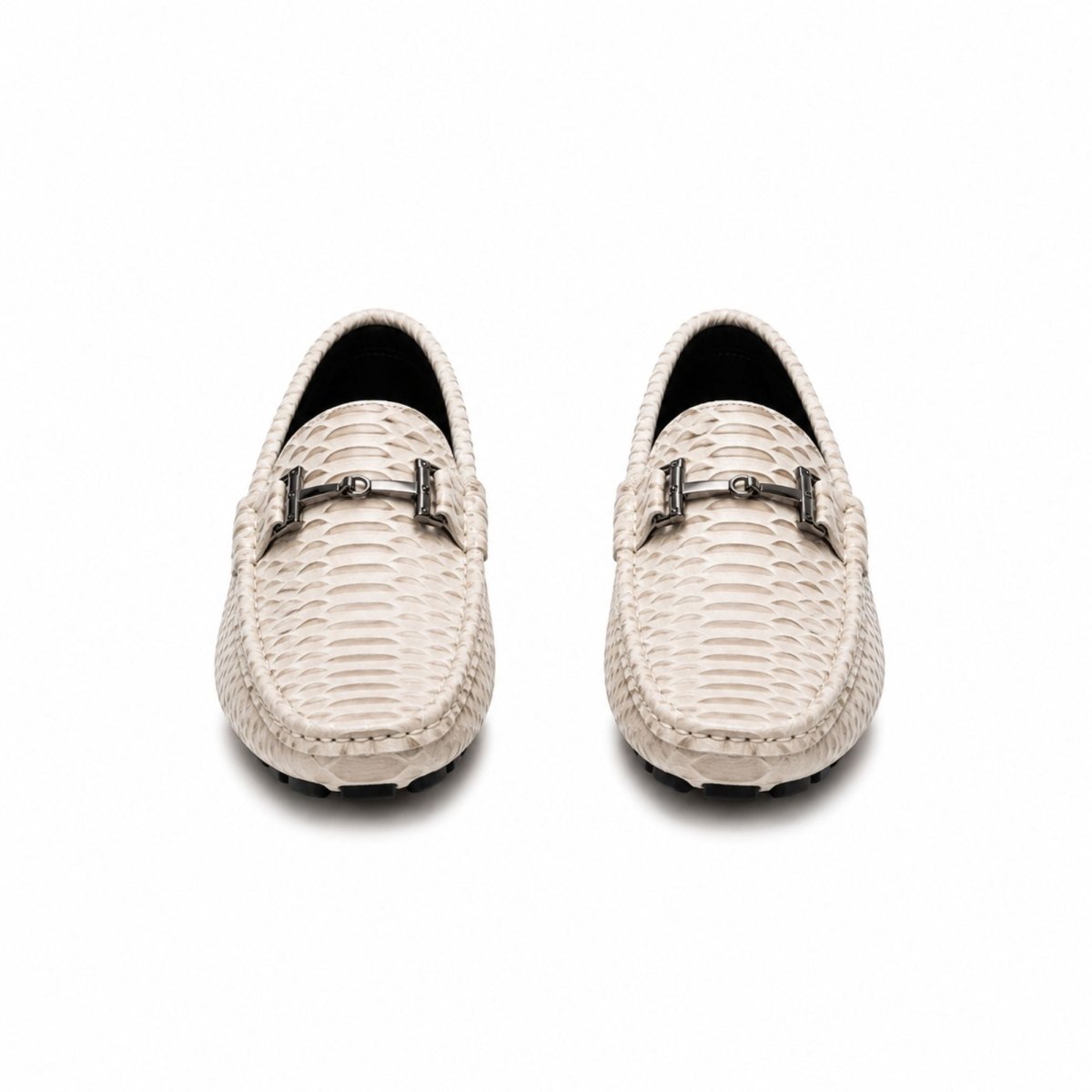 A pair of off-white woven leather loafers with a silver horsebit detail on the vamp, shown from a top-down view on a white background.