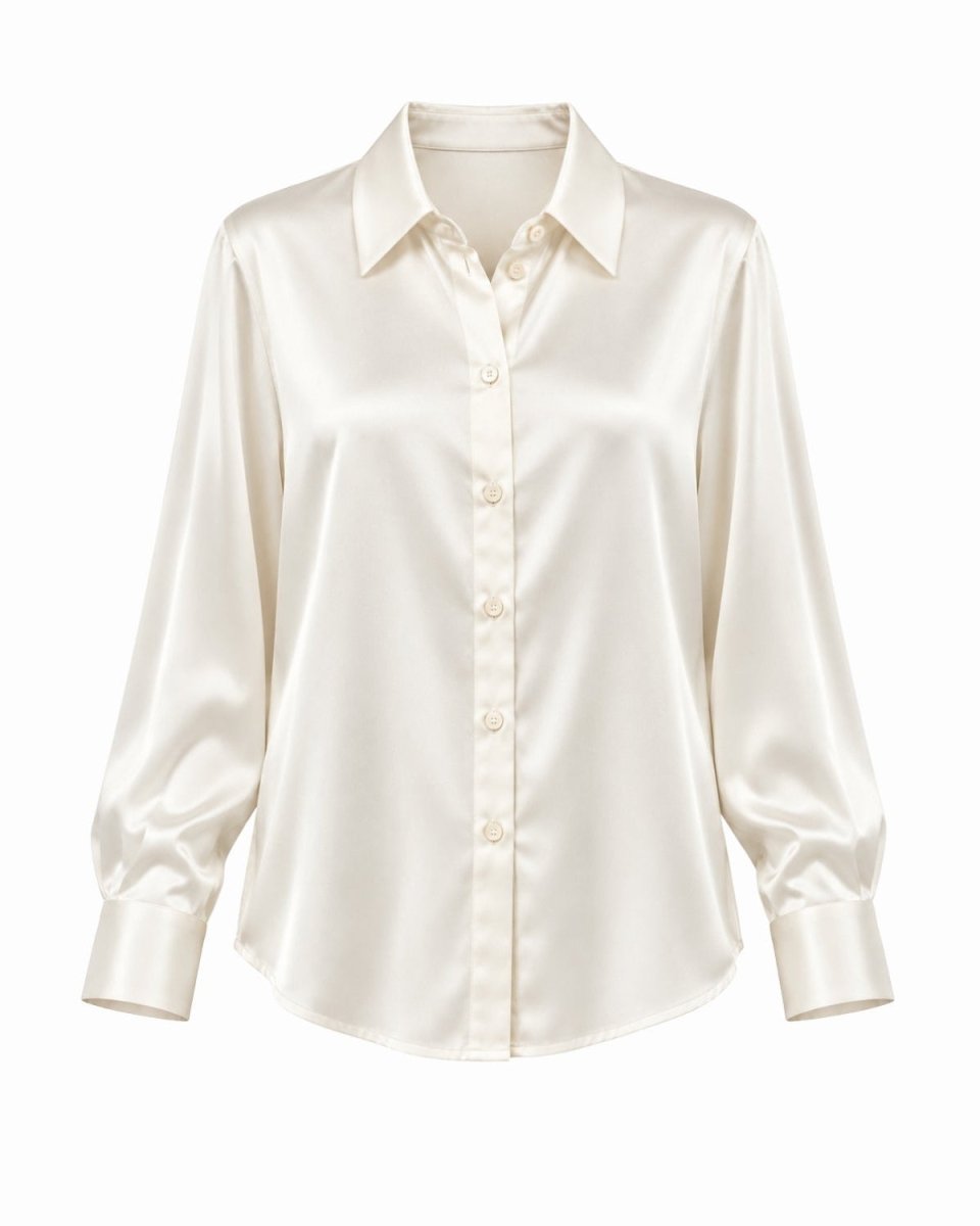 An white silk button-down shirt with a pointed collar and long sleeves, shown against a plain white background.