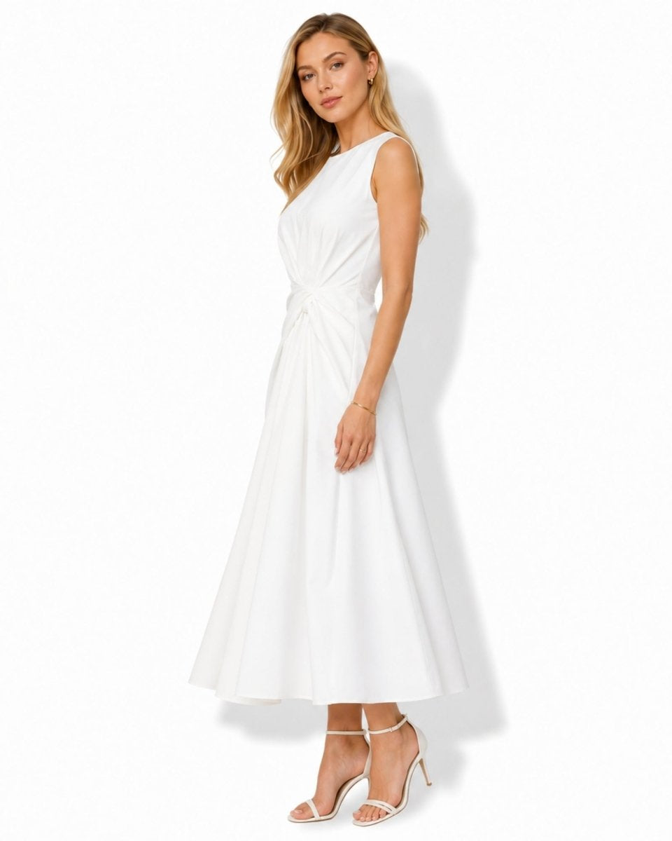  Beautiful front drape detail of elegant white A-line dress showing high quality structured fabric and expert twist knot waist craftsmanship.
