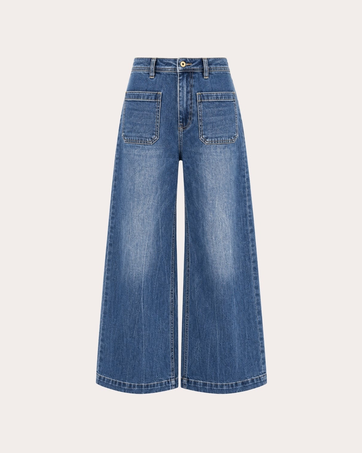 Front flatlay studio shot of medium blue wide leg denim jeans emphasizing the high waist construction and front pocket detailing.
