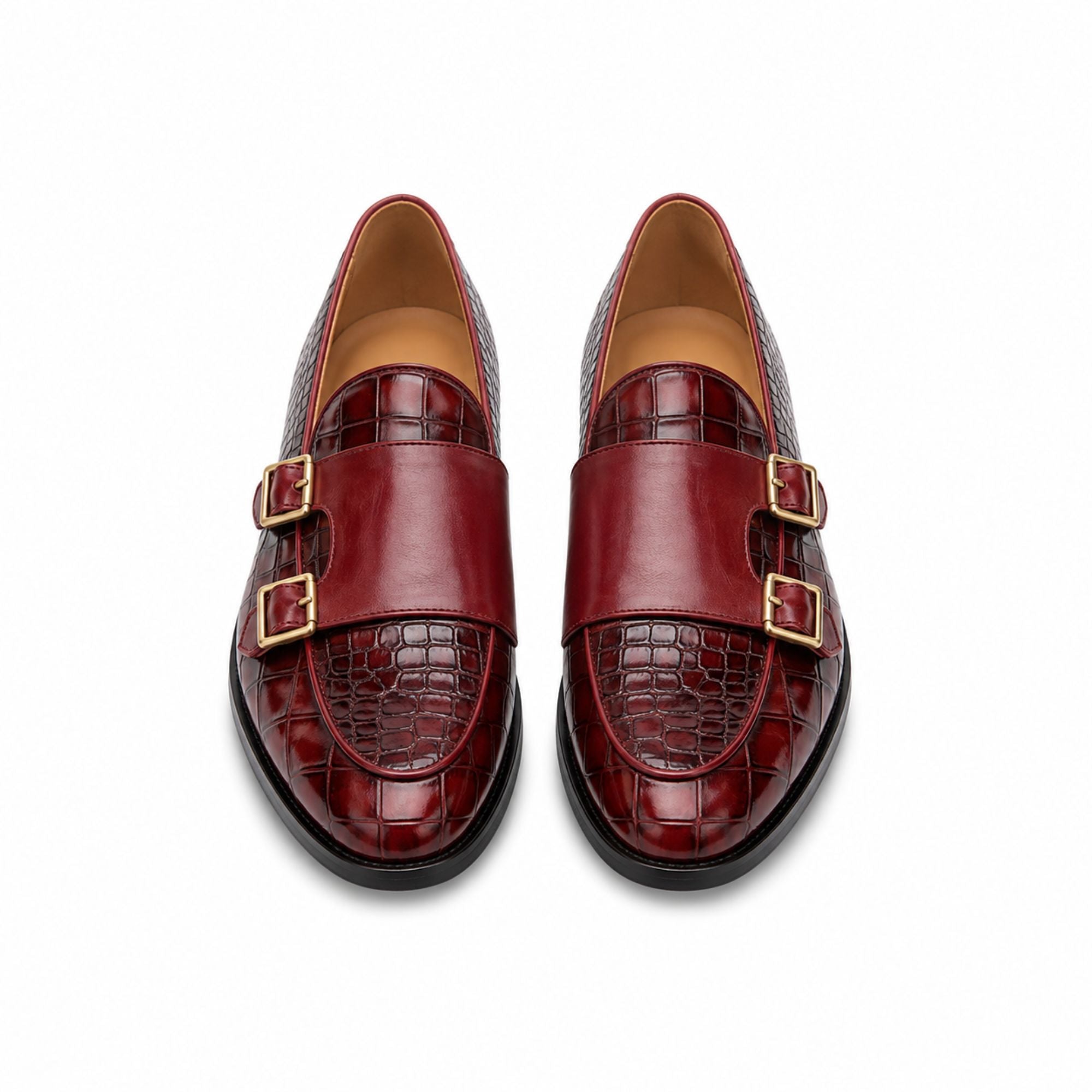 Top down view of men's burgundy red crocodile embossed leather double monk strap dress loafers with gold buckles