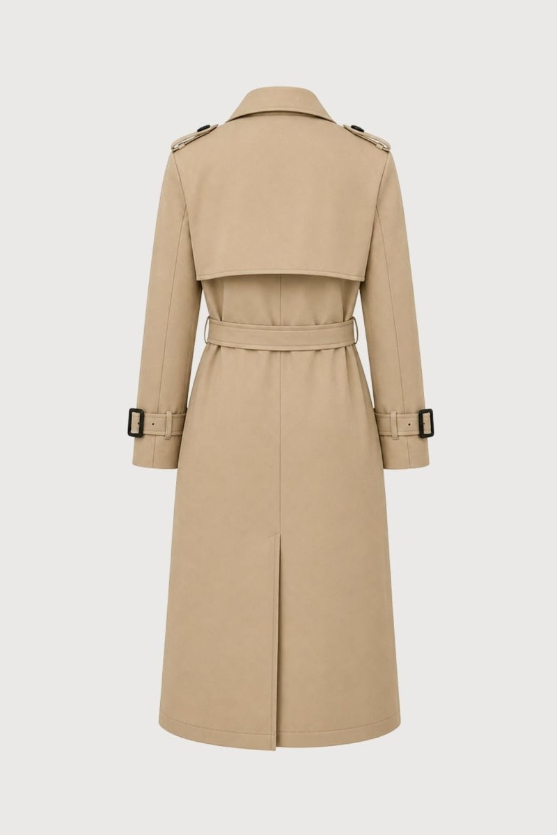 Flat lay product shot of the back of a women's khaki trench coat highlighting the shoulder epaulettes and back vent
