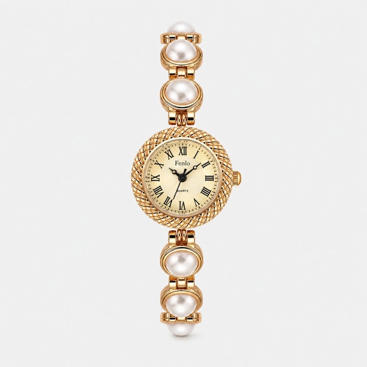 Detailed front view of the women's gold jewelry watch featuring elegant white pearl cabochons and a classic vintage-inspired watch face.