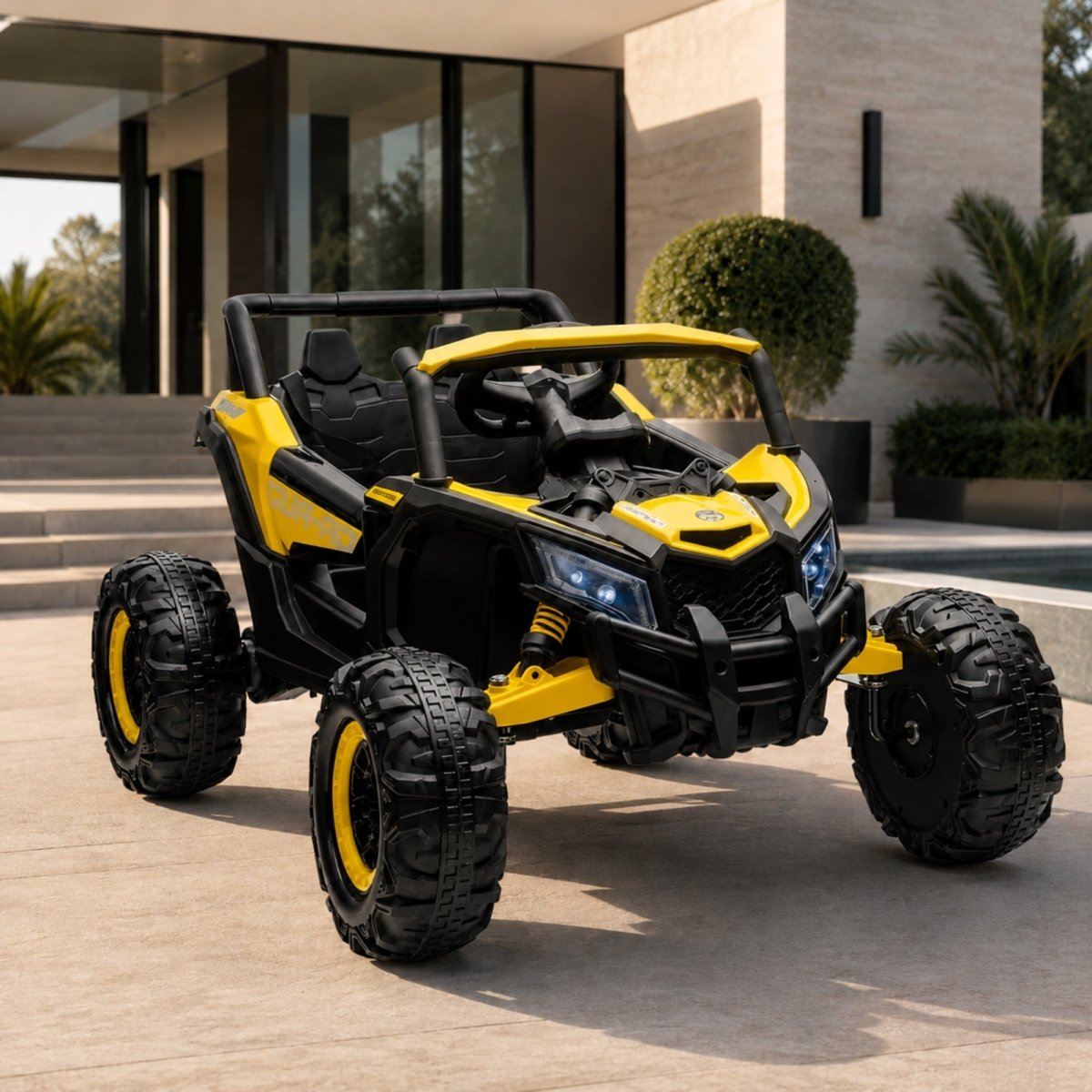 A bright yellow 24V kids' safari jeep buggy parked in front of a modern house, showing off high-grip tires and dual seating.