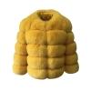 Flat lay studio product shot of the front of the collarless Alexia yellow faux fur jacket, showing the satin lining at the neck.