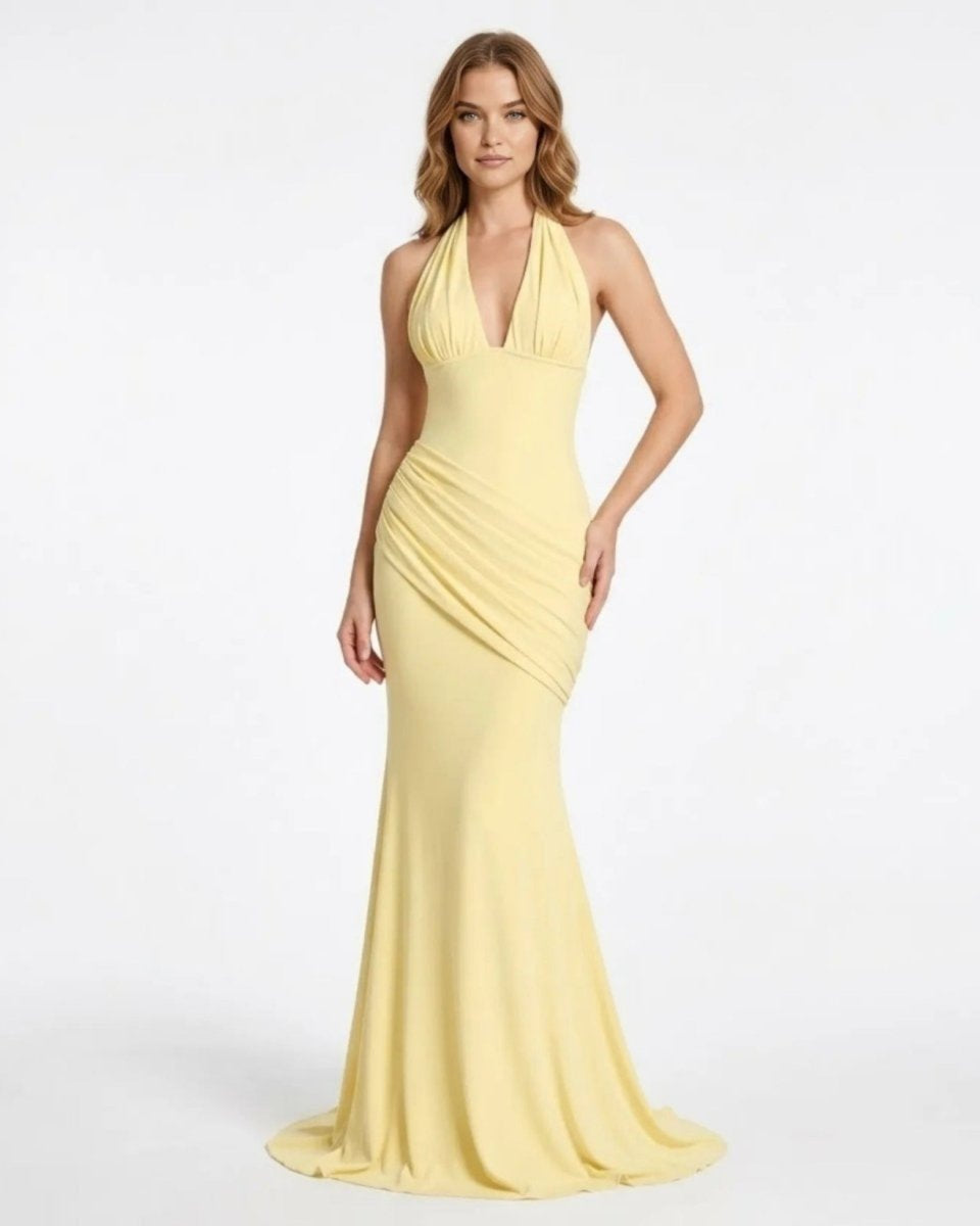 Front view of the Fenlo yellow halter neck ruched evening gown featuring a deep V-neckline and flattering draped waist.