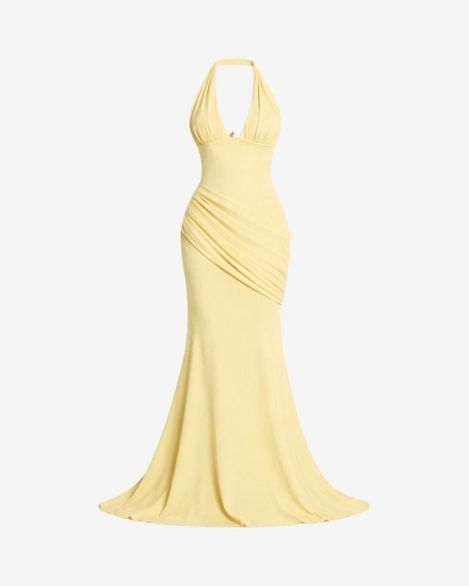 Ghost mannequin front styling of the luxury yellow halter ruched maxi gown displaying the bodice structure and fabric drape.