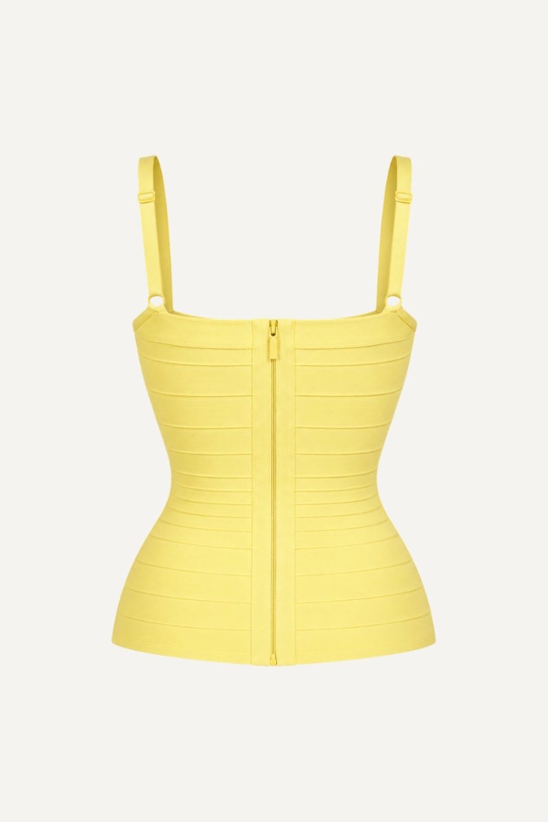 A bright yellow structured corset-style top with thin shoulder straps, a square neckline, and a front zipper, shown on a plain light background.